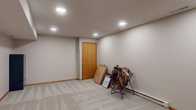 5121 Cameron Dr NW, Cascade Twp, MN 55901 - finished basement featuring baseboard heating, carpet floors, baseboards, and recessed lighting