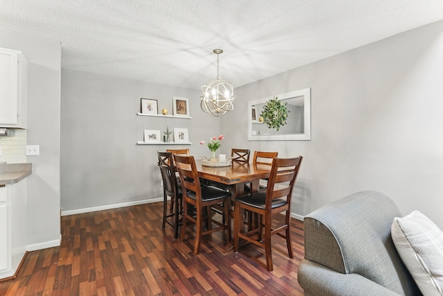 11219 16th St NE, Saint Michael, MN 55376 - dining area featuring a chandelier, dark wood-style floors, baseboards, and a textured ceiling