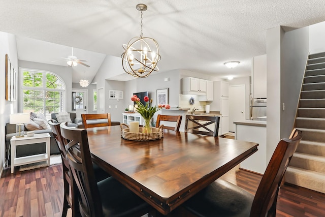 11219 16th St NE, Saint Michael, MN 55376 - dining space with stairway, dark wood-style flooring, a ceiling fan, a chandelier, and lofted ceiling