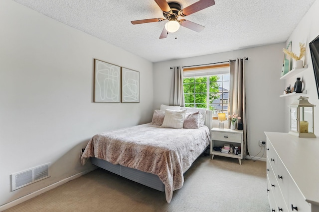 11219 16th St NE, Saint Michael, MN 55376 - bedroom featuring light carpet, a textured ceiling, ceiling fan, and baseboards