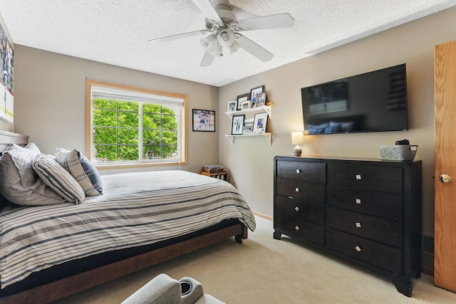 11219 16th St NE, Saint Michael, MN 55376 - bedroom featuring carpet flooring, ceiling fan, and a textured ceiling