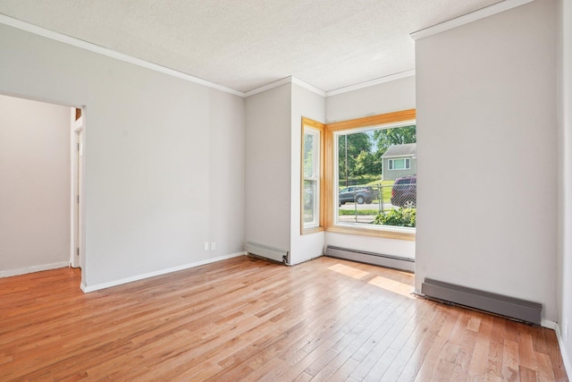 491 Belvidere St E, Saint Paul, MN 55107 - empty room with a baseboard heating unit, light wood finished floors, crown molding, a textured ceiling, and baseboard heating