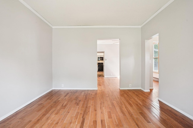 491 Belvidere St E, Saint Paul, MN 55107 - unfurnished room with ornamental molding, light wood-style flooring, and baseboards
