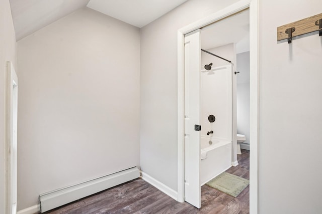 491 Belvidere St E, Saint Paul, MN 55107 - hall featuring a baseboard radiator, wood finished floors, vaulted ceiling, and baseboards