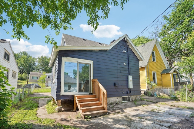 491 Belvidere St E, Saint Paul, MN 55107 - back of house with roof with shingles, a patio, and entry steps