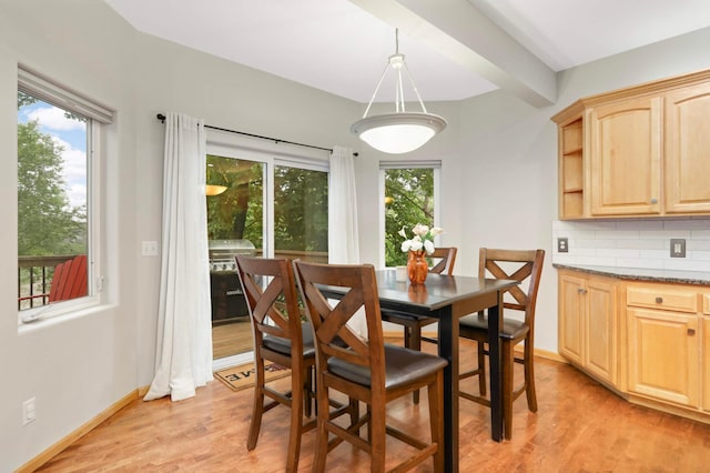 6242 Cavendish Pl, Eden Prairie, MN 55346 - dining space featuring light wood-style floors and beamed ceiling