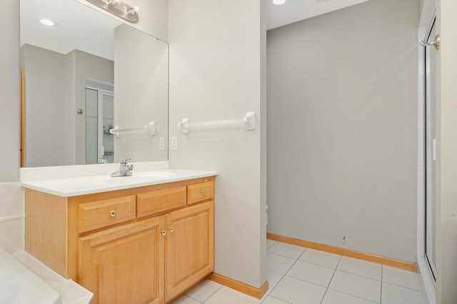 6242 Cavendish Pl, Eden Prairie, MN 55346 - full bath featuring vanity, an enclosed shower, and tile patterned floors