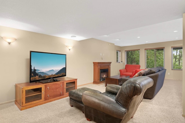 6242 Cavendish Pl, Eden Prairie, MN 55346 - living room featuring carpet, a warm lit fireplace, and recessed lighting