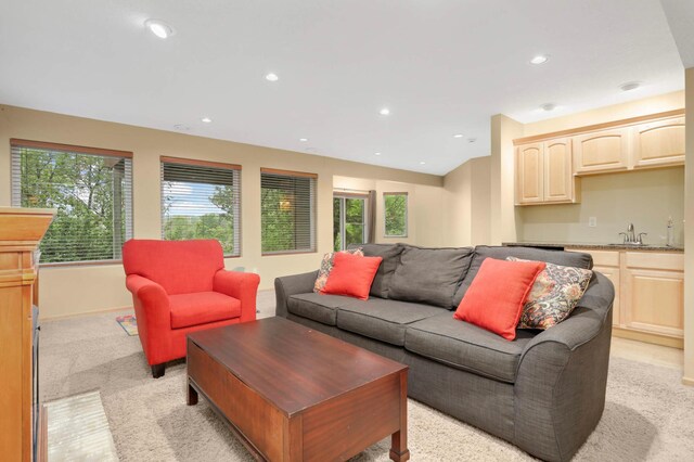6242 Cavendish Pl, Eden Prairie, MN 55346 - living room featuring light colored carpet, healthy amount of natural light, wet bar, and recessed lighting