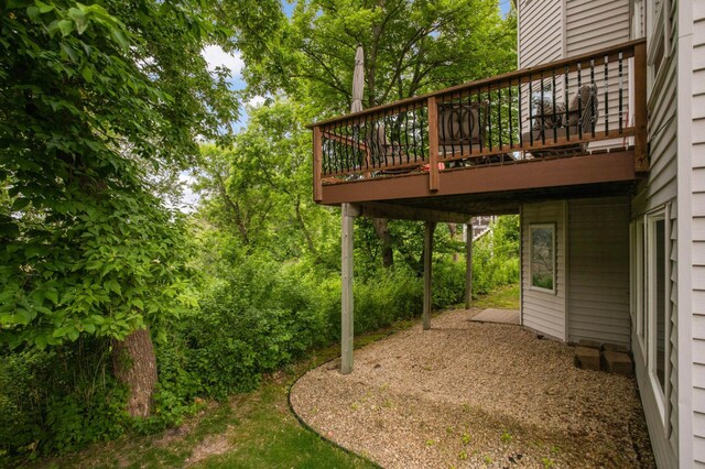 6242 Cavendish Pl, Eden Prairie, MN 55346 - view of yard featuring a wooden deck and a garage