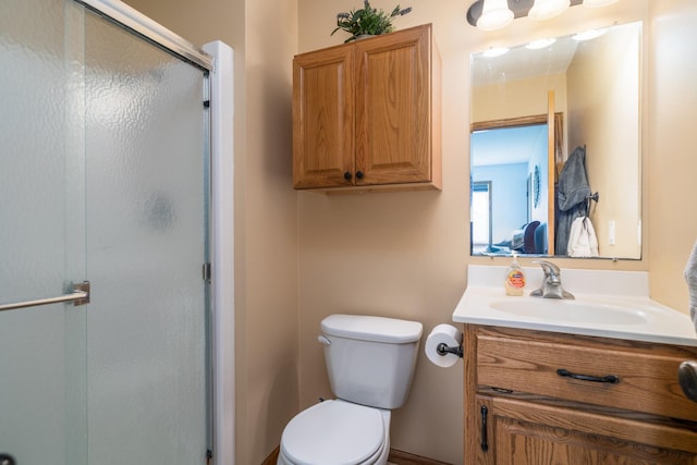 1022 Wilson Ave, Crookston, MN 56716 - full bath featuring vanity, a shower stall, and toilet