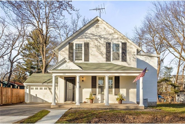 712 Anderson St W, Stillwater, MN 55082 - view of front of home featuring covered porch, driveway, and a garage