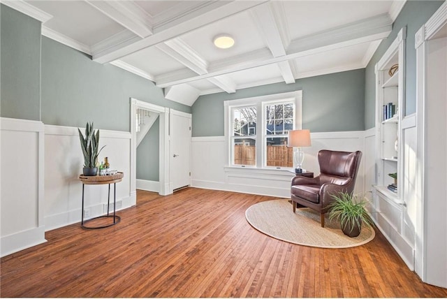 712 Anderson St W, Stillwater, MN 55082 - living area featuring beam ceiling, hardwood / wood-style floors, coffered ceiling, a decorative wall, and a wainscoted wall