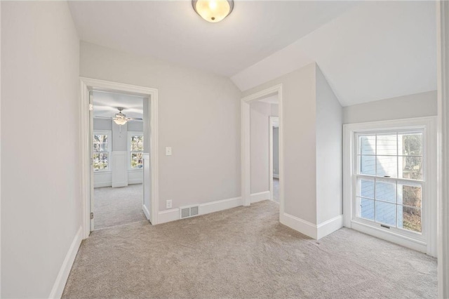 712 Anderson St W, Stillwater, MN 55082 - spare room with carpet, plenty of natural light, vaulted ceiling, baseboards, and ceiling fan