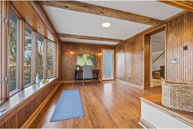 712 Anderson St W, Stillwater, MN 55082 - workout room with wood walls, wood finished floors, and baseboards