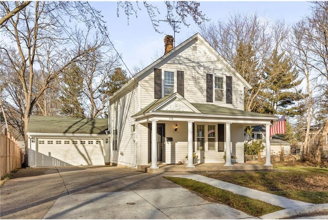 712 Anderson St W, Stillwater, MN 55082 - view of front of property featuring a chimney, driveway, and covered porch