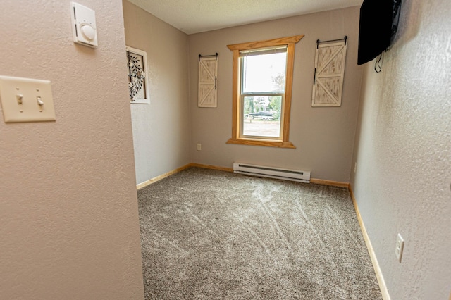 17366 Ryan Dr NE, Osakis, MN 56360 - empty room with baseboard heating, a textured wall, carpet flooring, and baseboards