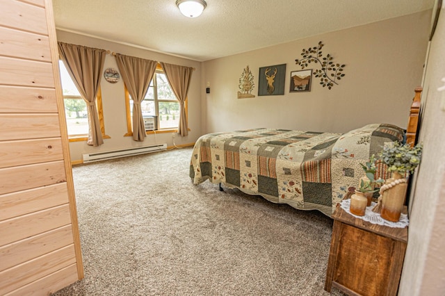 17366 Ryan Dr NE, Osakis, MN 56360 - bedroom featuring a baseboard heating unit, carpet flooring, and a textured ceiling