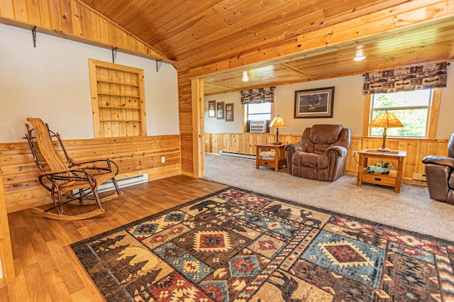 17366 Ryan Dr NE, Osakis, MN 56360 - living room with wood ceiling, wood walls, a baseboard radiator, a wainscoted wall, and vaulted ceiling
