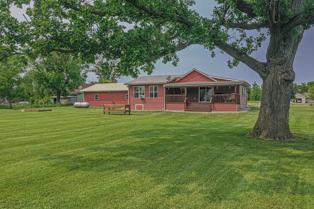 17366 Ryan Dr NE, Osakis, MN 56360 - rear view of house featuring a yard