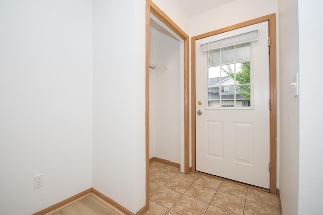 412 Cedar Pl, Maple Lake, MN 55358 - doorway to outside featuring baseboards