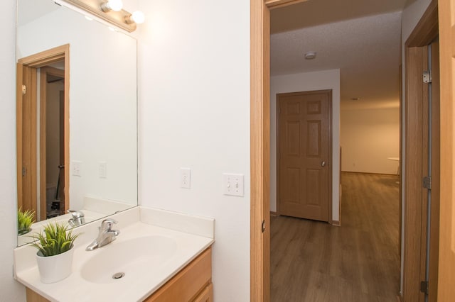 412 Cedar Pl, Maple Lake, MN 55358 - bathroom with wood finished floors and vanity