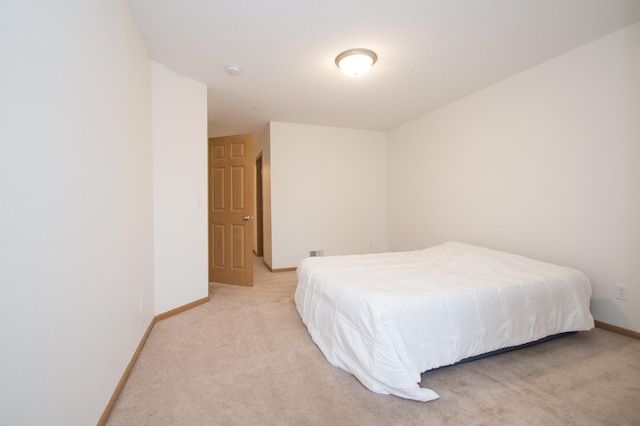 412 Cedar Pl, Maple Lake, MN 55358 - bedroom featuring light colored carpet and baseboards