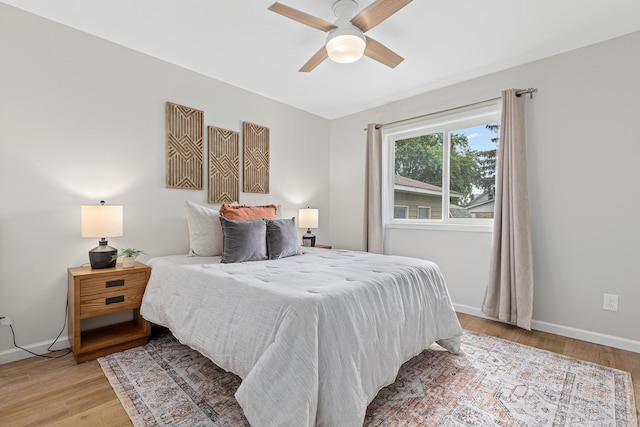 232 26th Ave N, Saint Cloud, MN 56303 - bedroom with light wood-style floors and ceiling fan