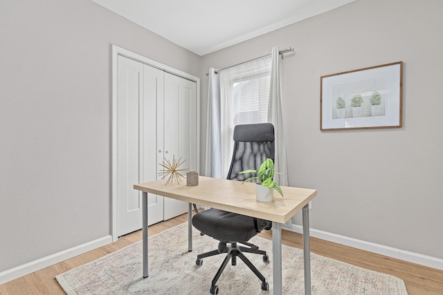 232 26th Ave N, Saint Cloud, MN 56303 - office area featuring baseboards and wood finished floors