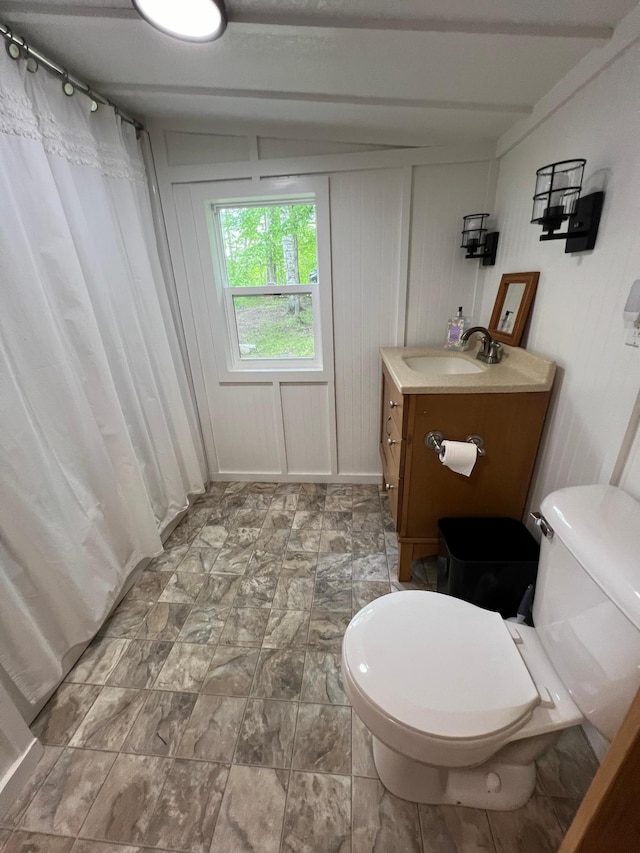 32074 315th Pl, Glen Twp, MN 56431 - full bath with toilet, vanity, beam ceiling, and a shower with curtain