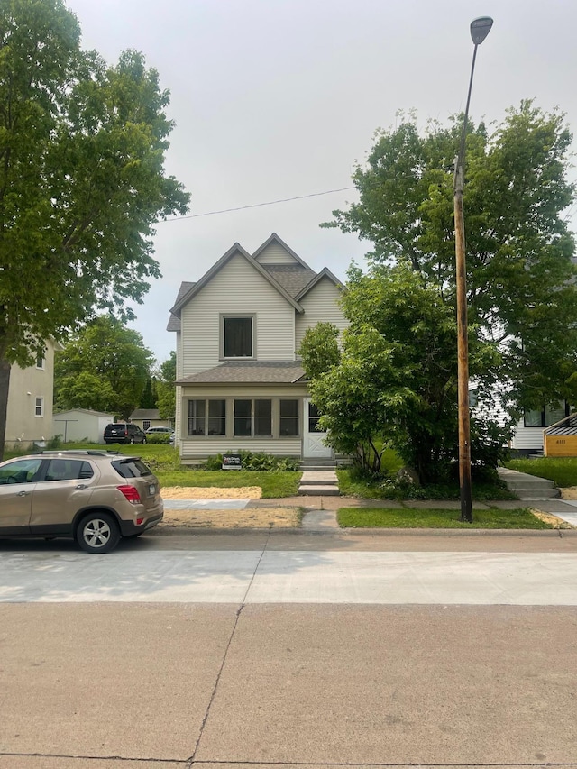 4105 Colfax Ave N, Minneapolis, MN 55412 - view of front of property featuring roof with shingles