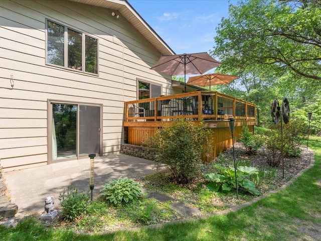 5863 Foley Rd, Baxter, MN 56425 - back of house with a deck and a patio area