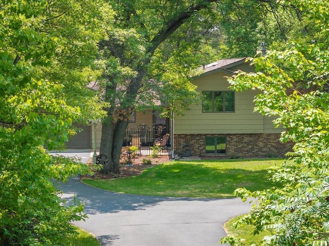 5863 Foley Rd, Baxter, MN 56425 - view of front of home featuring brick siding