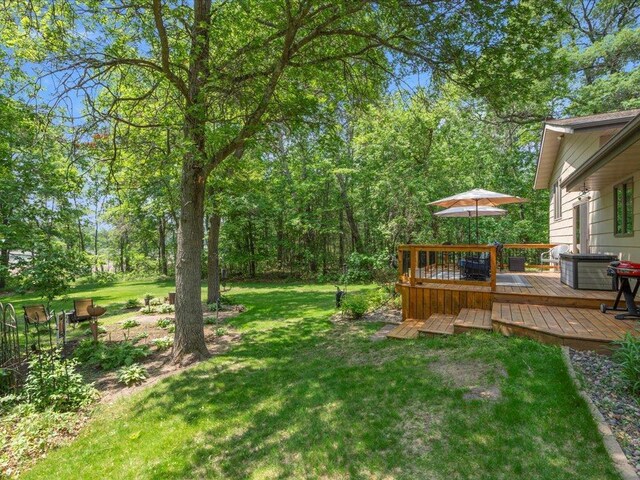 5863 Foley Rd, Baxter, MN 56425 - view of grassy yard with a wooden deck