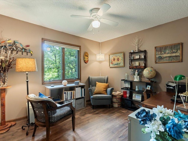 5863 Foley Rd, Baxter, MN 56425 - sitting room featuring wood finished floors, a ceiling fan, and a textured ceiling