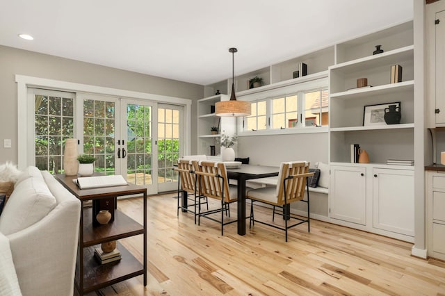 1241 Cedar Lake Rd S, Minneapolis, MN 55416 - dining area featuring light wood-style floors, french doors, recessed lighting, and built in features