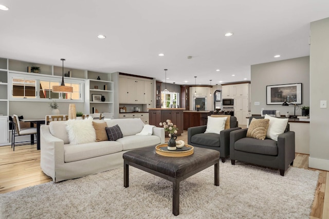 1241 Cedar Lake Rd S, Minneapolis, MN 55416 - living room with light wood-type flooring and recessed lighting