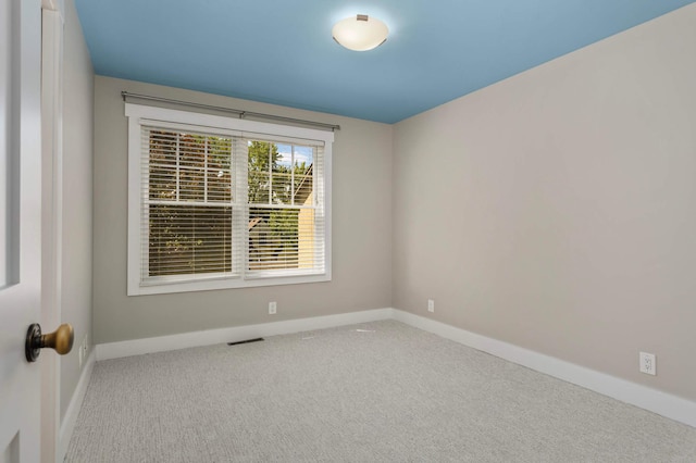 1241 Cedar Lake Rd S, Minneapolis, MN 55416 - carpeted empty room with baseboards