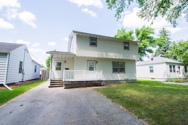 1618 10th St N, Fargo, ND 58102 - view of front of house featuring a front lawn and a deck
