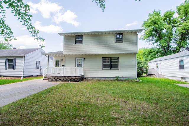1618 10th St N, Fargo, ND 58102 - colonial inspired home with a front yard and driveway