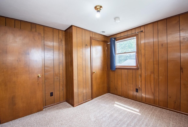 1618 10th St N, Fargo, ND 58102 - unfurnished bedroom featuring carpet and wooden walls