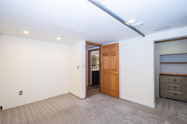 1618 10th St N, Fargo, ND 58102 - below grade area featuring light colored carpet and recessed lighting