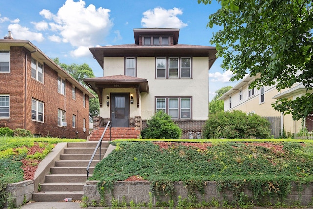 1601 Charles Ave, Saint Paul, MN 55104 - traditional style home featuring stucco siding and brick siding
