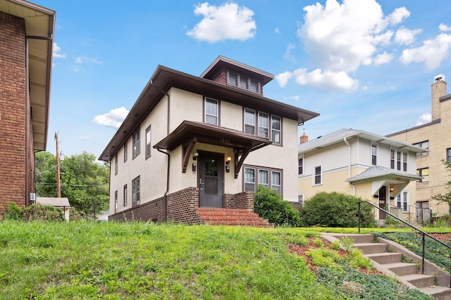 1601 Charles Ave, Saint Paul, MN 55104 - traditional style home featuring stucco siding and brick siding