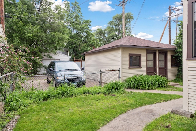 1601 Charles Ave, Saint Paul, MN 55104 - view of side of property with a shingled roof
