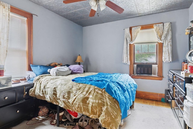 1601 Charles Ave, Saint Paul, MN 55104 - bedroom with wood finished floors, an ornate ceiling, and ceiling fan