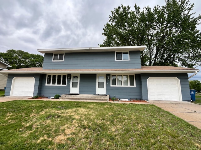 715 Circle Dr, Champlin, MN 55316 - traditional-style house featuring an attached garage, driveway, and a front lawn