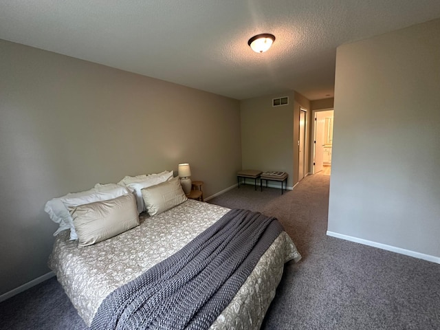 691 85th Ln NW Unit 1, Coon Rapids, MN 55433 - carpeted bedroom with baseboards and a textured ceiling
