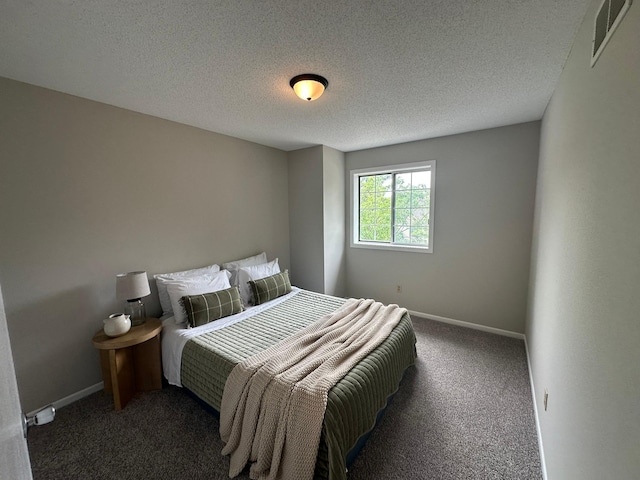 691 85th Ln NW Unit 1, Coon Rapids, MN 55433 - carpeted bedroom featuring baseboards and a textured ceiling