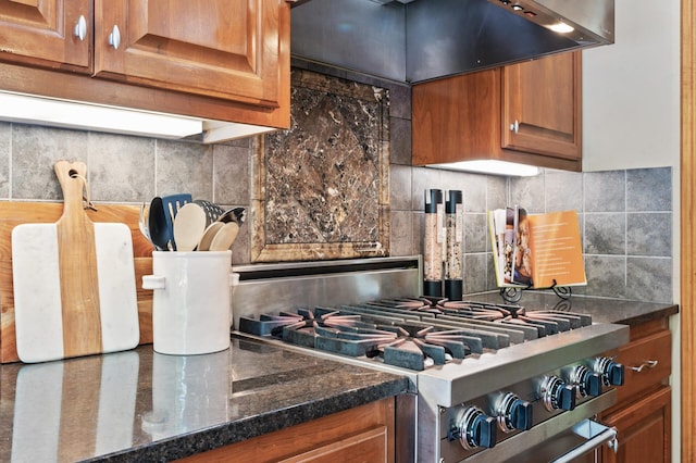 8867 Aviary Path, Inver Grove Heights, MN 55077 - kitchen featuring exhaust hood, stove, decorative backsplash, and brown cabinetry